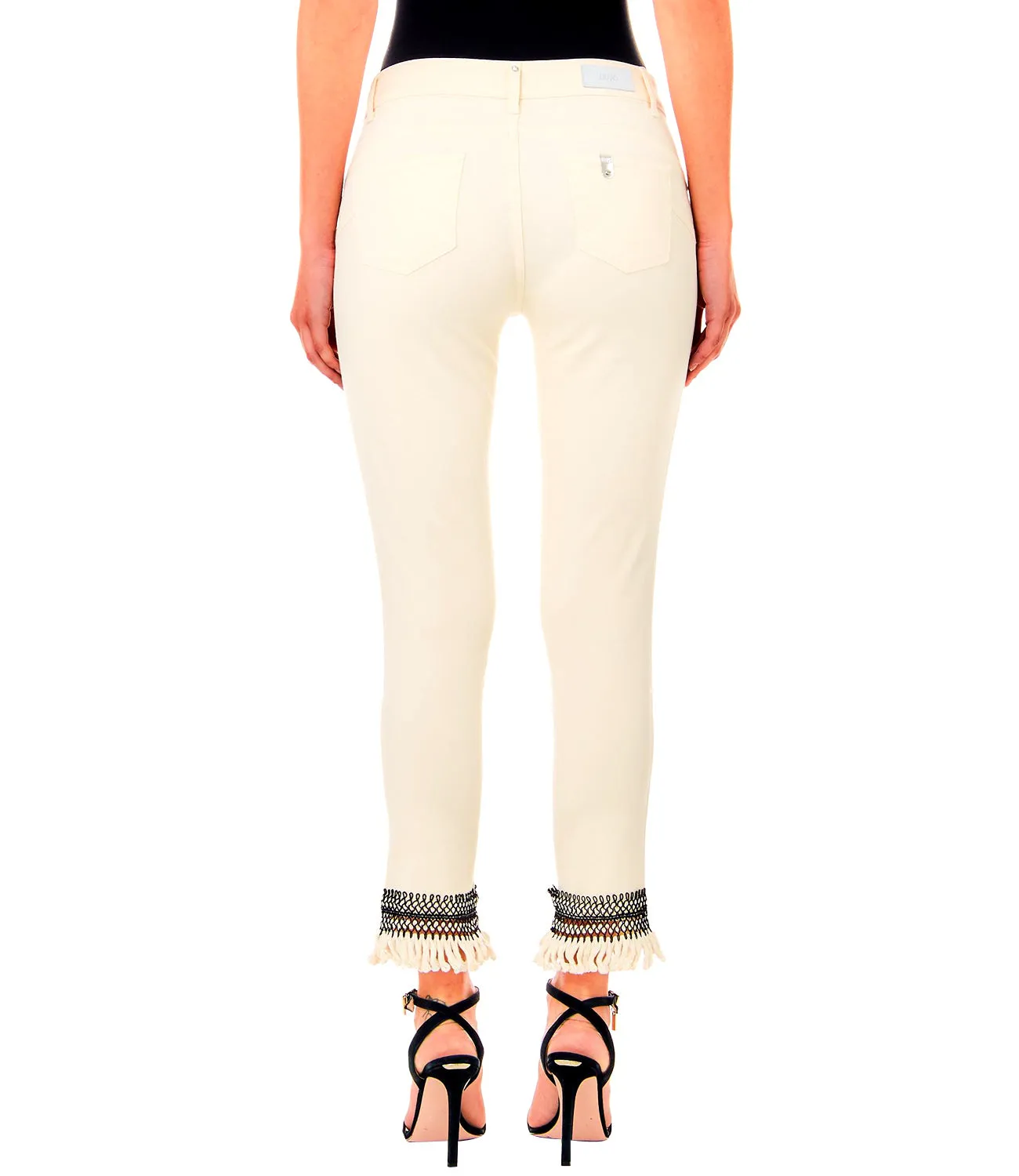 Pantaloni con fondo ricamo